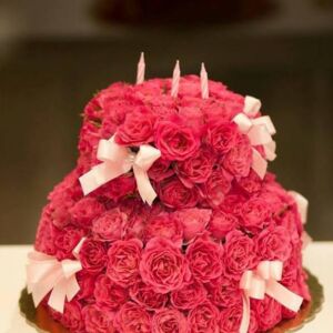 Fuschia flower cake with bows